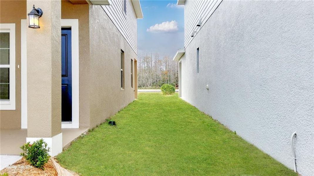 Exterior details and patio area of a home in , Harmony (Image 3).