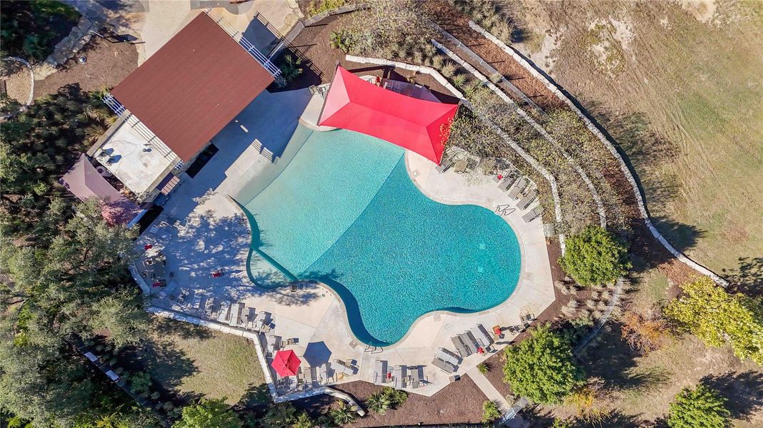 View from above of property featuring a pool area View from above of property featuring a pool area