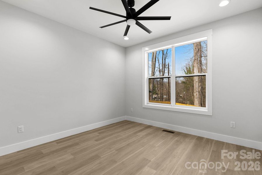 Spacious, unfurnished interior of a new home in , Asheville (Image 35).