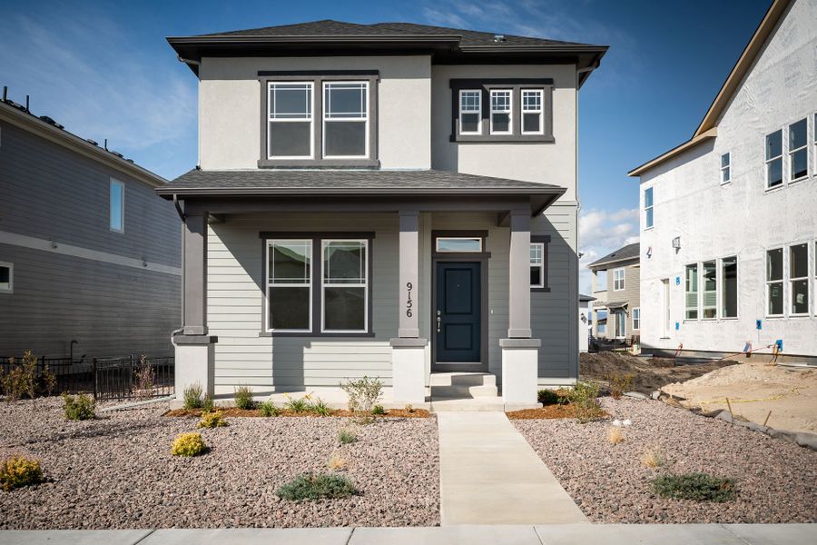 Front exterior of a home in the Revel Crossing at Wolf Ranch – The Outlook Collection community, located in Colorado Springs, CO (Image 11).