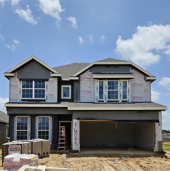 Front exterior of a new home in Granger Pines, Conroe, TX, highlighting curb appeal (Image 1). Front exterior of a new home in Granger Pines, Conroe, TX, highlighting curb appeal (Image 1).
