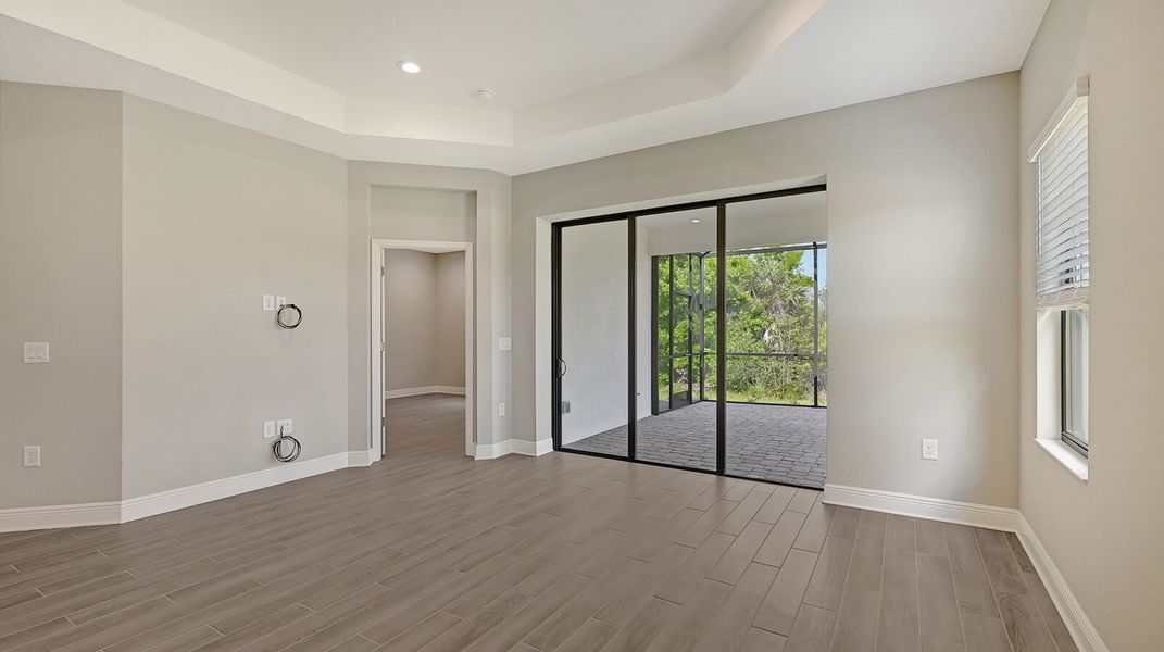 Spacious, unfurnished interior of a new home in Boca Royale Golf and Country Club at Wellen Park, Englewood (Image 19).