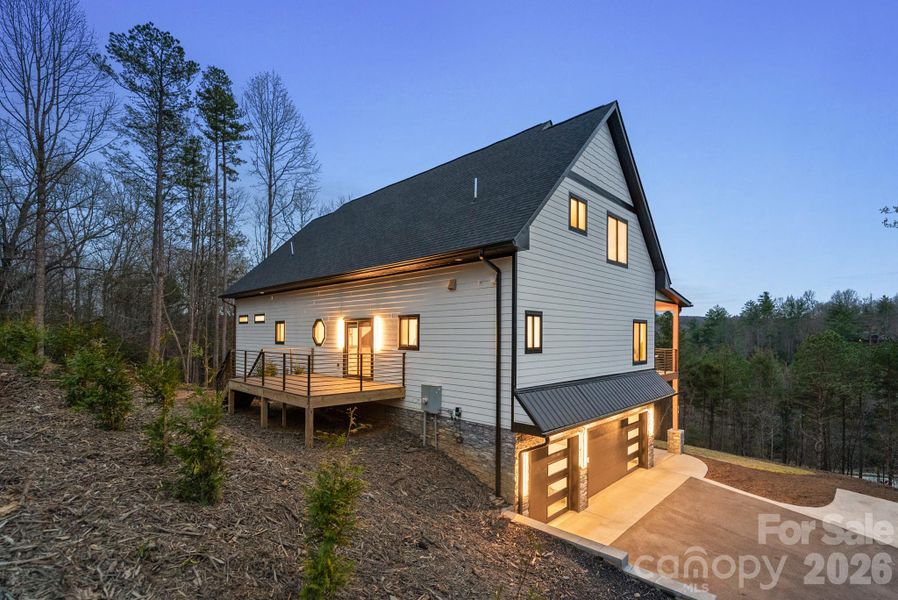 Exterior details and patio area of a home in , Mills River (Image 30).
