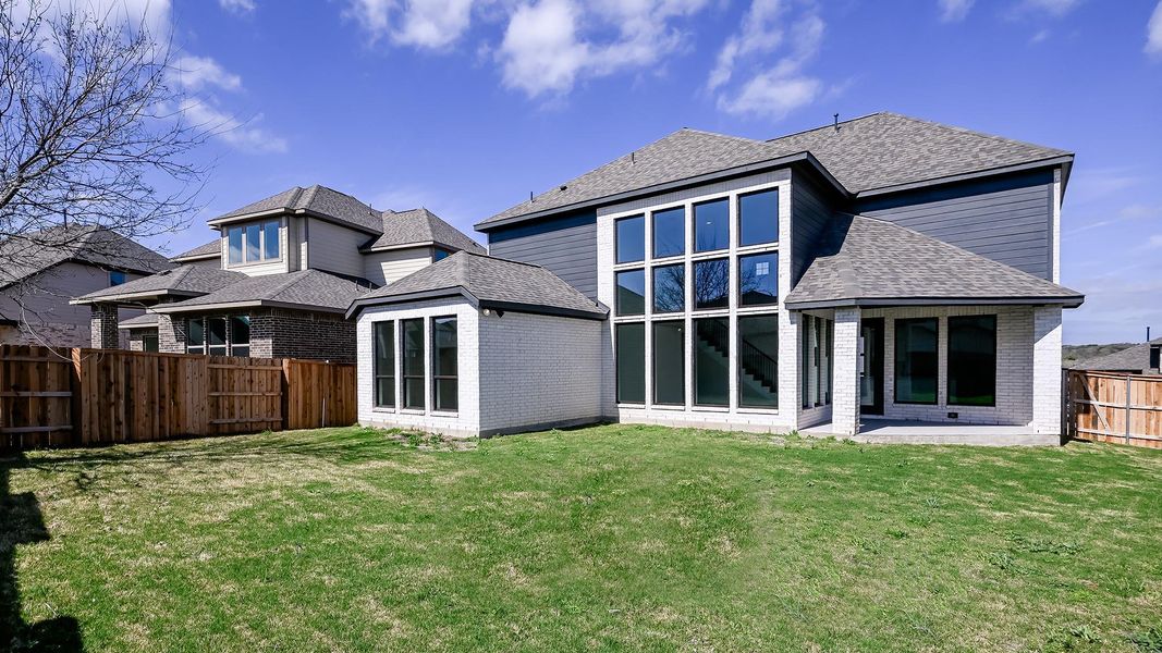 Exterior details and patio area of a home in 6 Creeks, Kyle (Image 21).