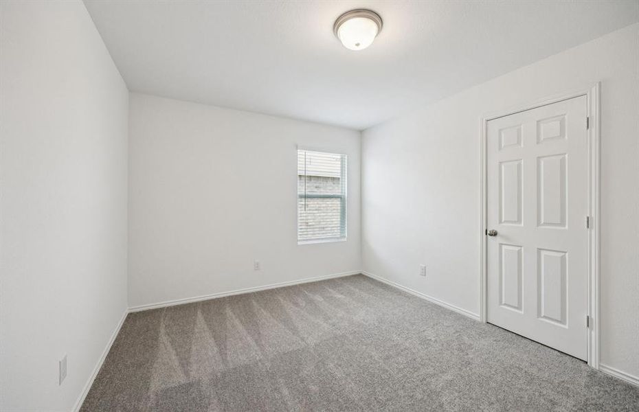 Spacious secondary bedroom with ample closet space Spacious secondary bedroom with ample closet space