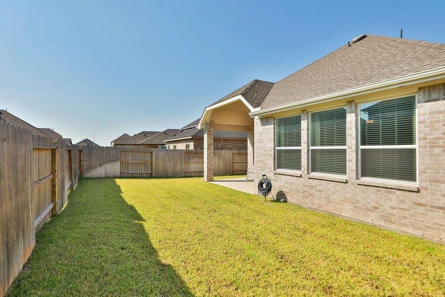 Exterior details and patio area of a home in , Katy (Image 25). Exterior details and patio area of a home in , Katy (Image 25).
