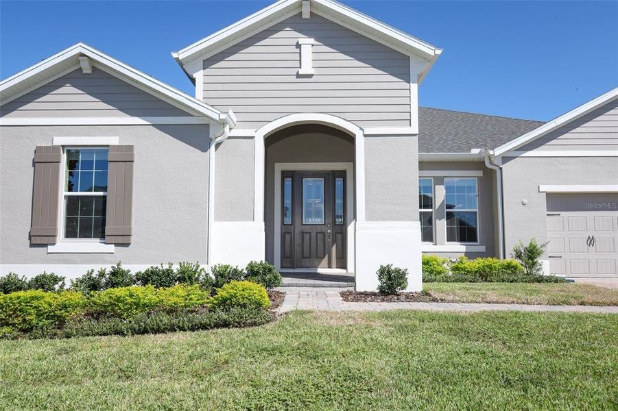 Exterior details and patio area of a home in Wolf Lake Ranch, Apopka (Image 21).