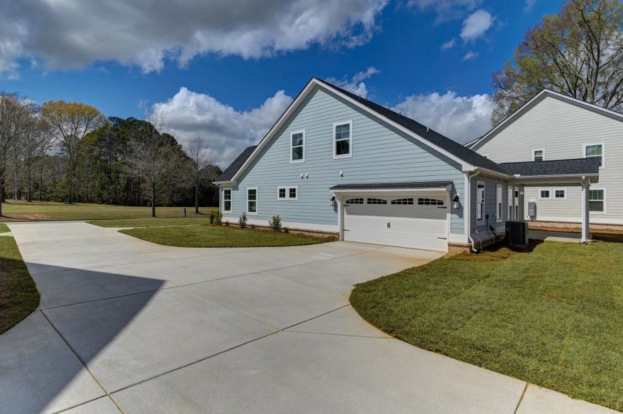 Front exterior of a new home in Clubside Reserve at Summerlake, Lexington, SC, highlighting curb appeal (Image 29).