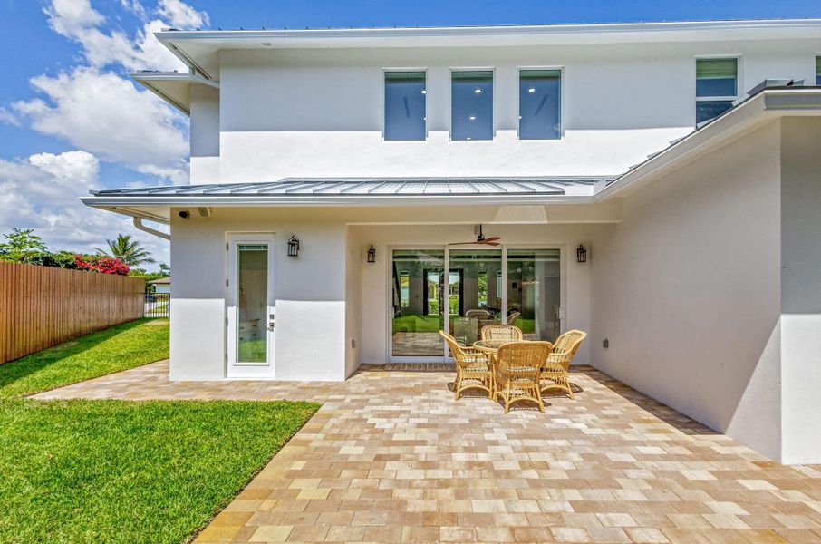 Front exterior of a new home in , North Palm Beach, FL, highlighting curb appeal (Image 2). Front exterior of a new home in , North Palm Beach, FL, highlighting curb appeal (Image 2).