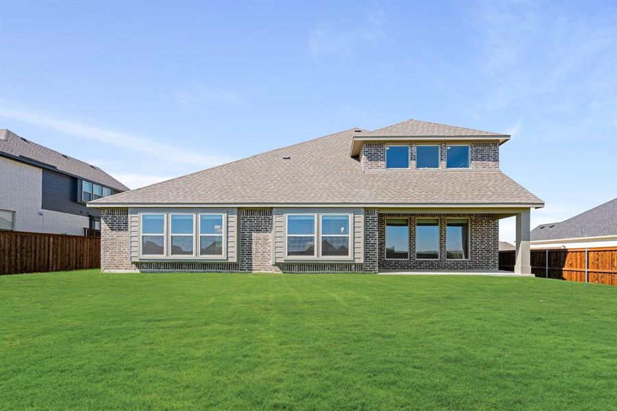 Exterior details and patio area of a home in Wildcat Ridge Phase 3, Godley (Image 26).