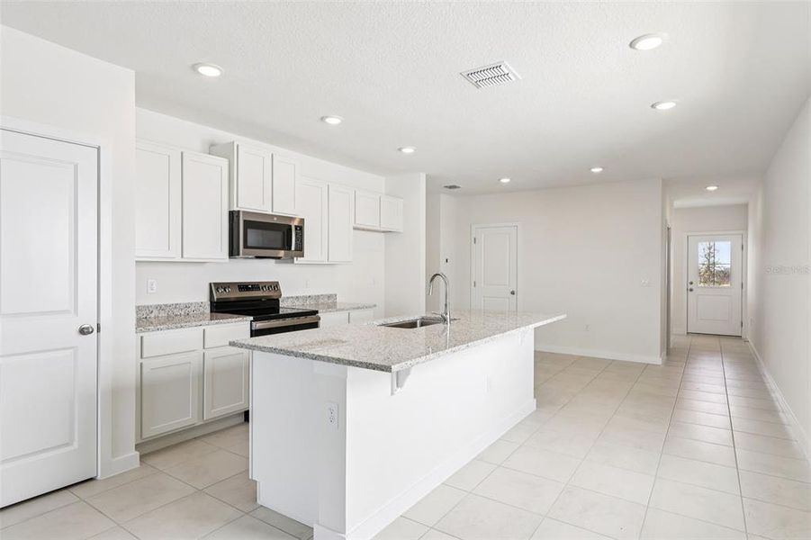 Furnished interior view inside a new home in Hamilton Bluff, Haines City (Image 6).