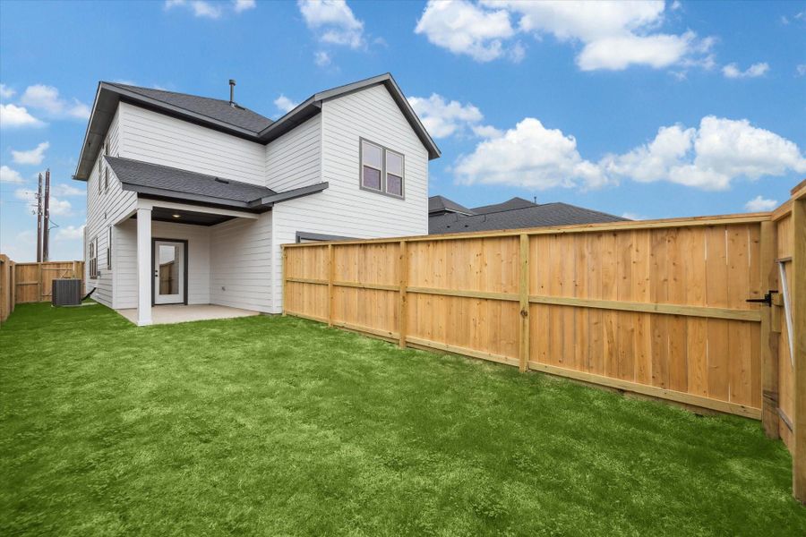 Exterior details and patio area of a home in Elyson, Katy (Image 24).