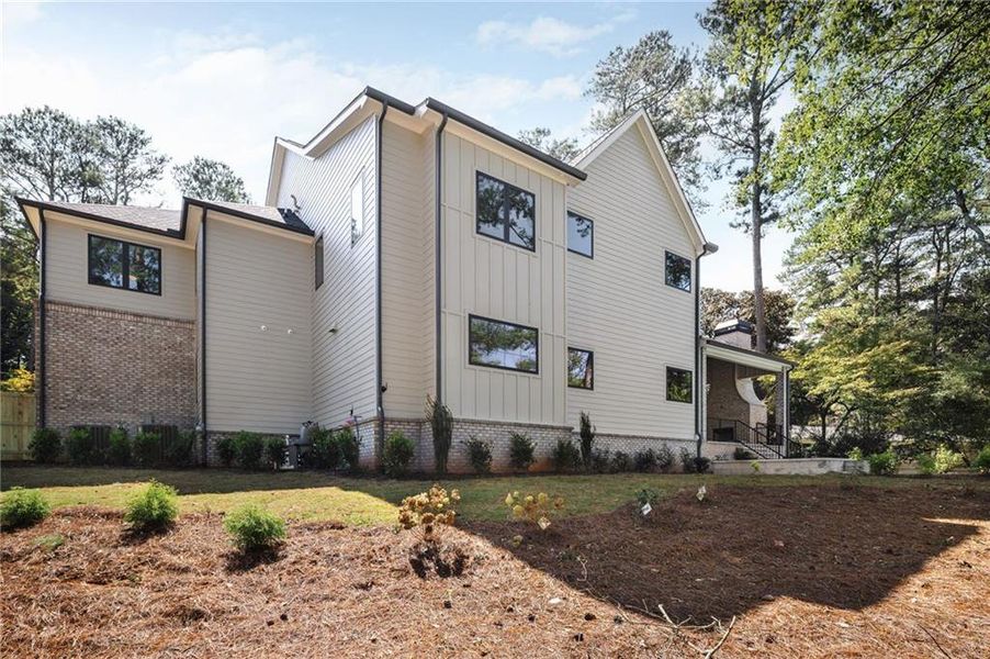 Front exterior of a new home in , Brookhaven, GA, highlighting curb appeal (Image 31).