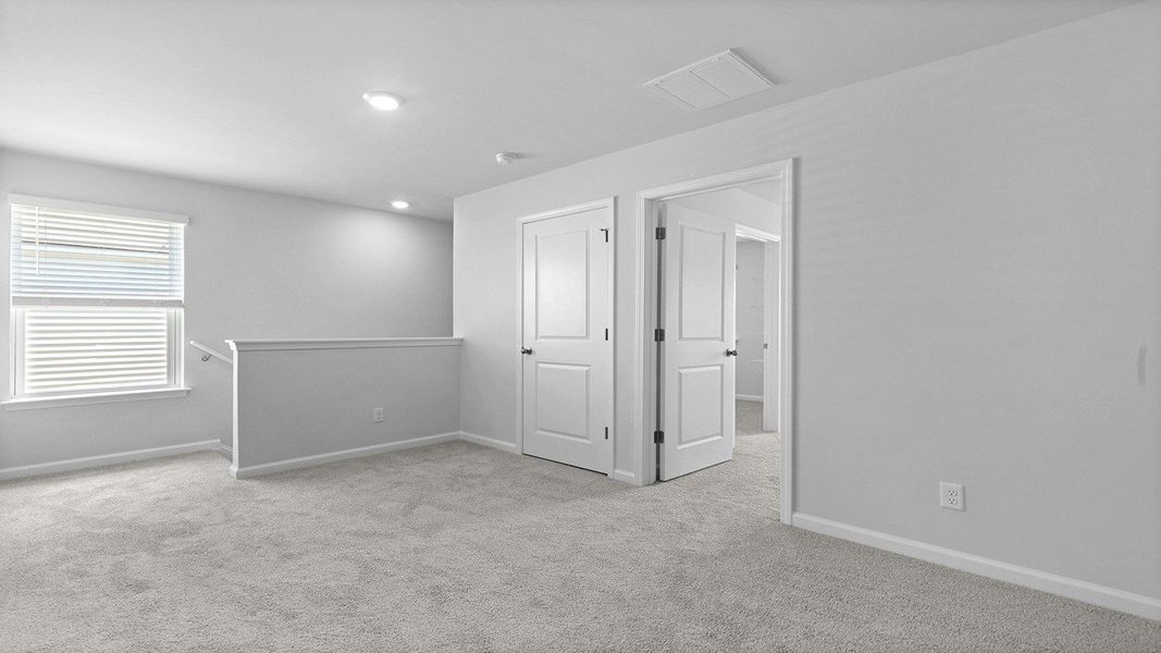 Spacious, unfurnished interior of a new home in Pine Hills at Cane Bay, Summerville (Image 16). Spacious, unfurnished interior of a new home in Pine Hills at Cane Bay, Summerville (Image 16).
