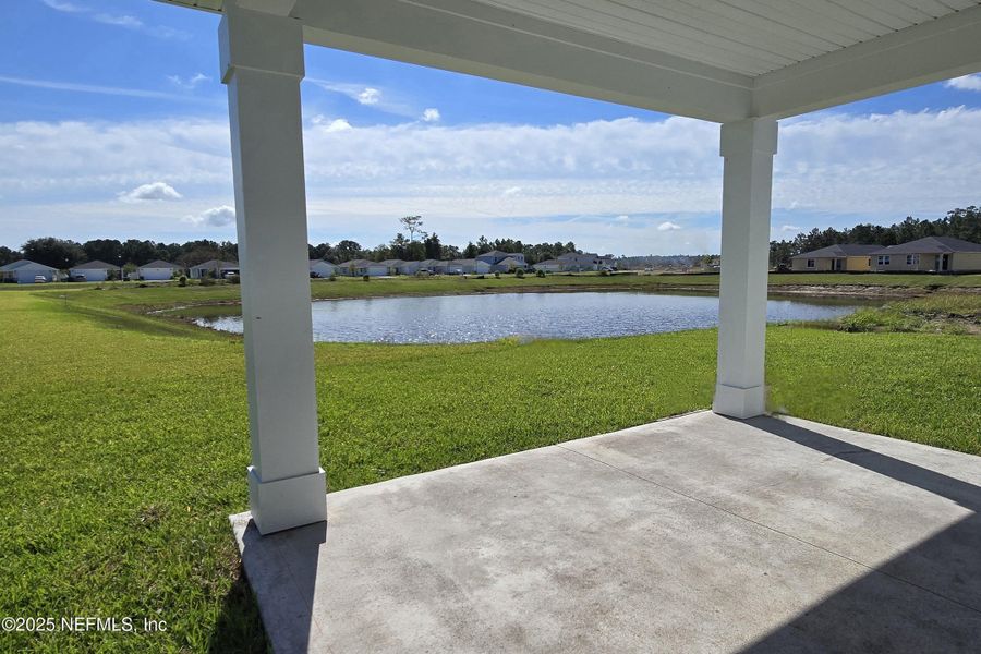 Exterior details and patio area of a home in Lakes at Bella Lago - Signature Series, Green Cove Springs (Image 19).