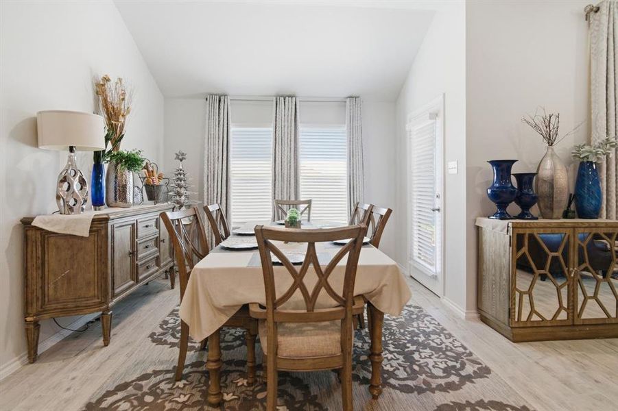 Large eating space with bright windows