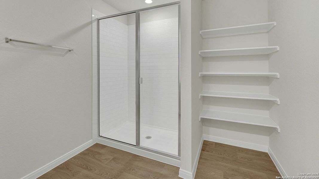 Spacious, unfurnished interior of a new home in Whisper South, San Marcos (Image 26).