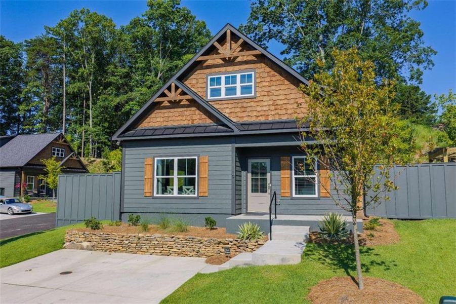 Front exterior of a new home in , Waleska, GA, highlighting curb appeal (Image 1). Front exterior of a new home in , Waleska, GA, highlighting curb appeal (Image 1).