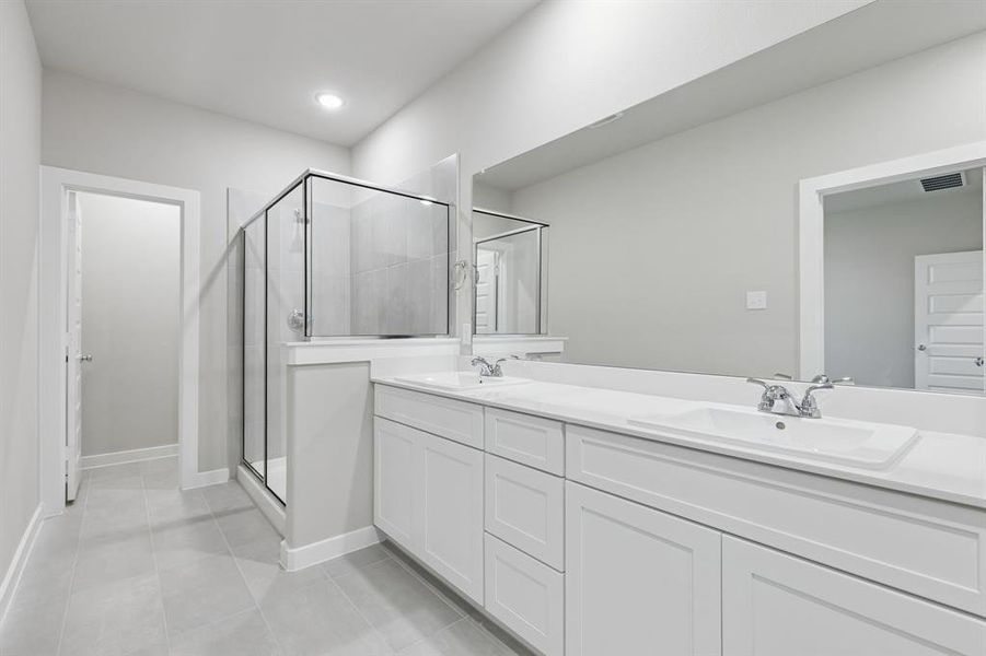 Primary Bathroom in the Holden home plan by Trophy Signature Homes – REPRESENTATIVE PHOTO Primary Bathroom in the Holden home plan by Trophy Signature Homes – REPRESENTATIVE PHOTO