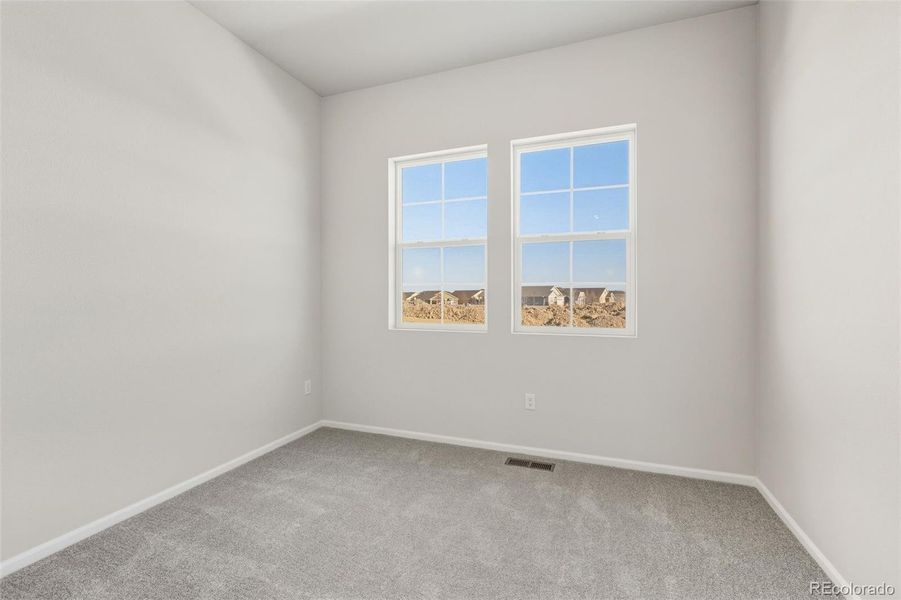 Spacious, unfurnished interior of a new home in Talon Pointe, Thornton (Image 26).