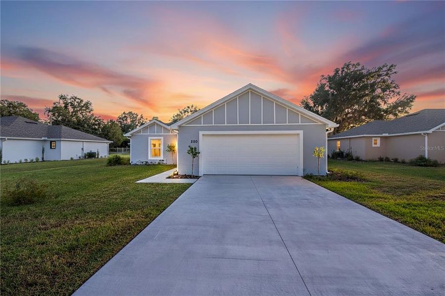 Front exterior of a new home in , Fort Meade, FL, highlighting curb appeal (Image 19). Front exterior of a new home in , Fort Meade, FL, highlighting curb appeal (Image 19).