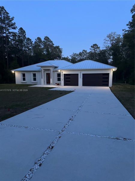 Front exterior of a new home in , Ocala, FL, highlighting curb appeal (Image 24).