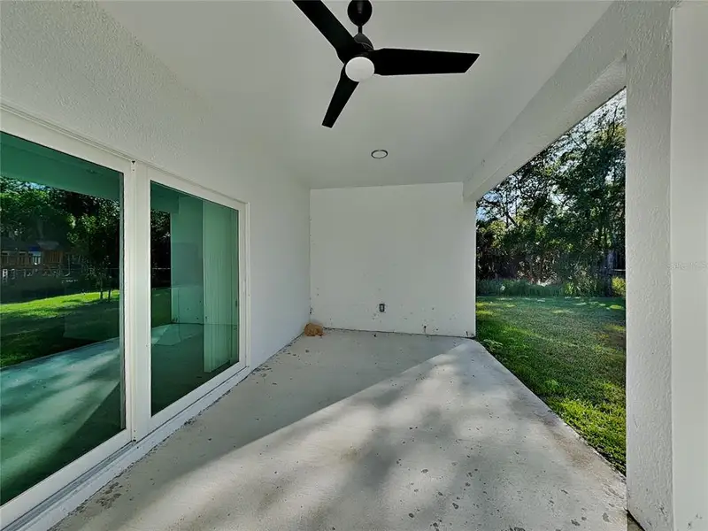 Exterior details and patio area of a home in , Port Charlotte (Image 17).