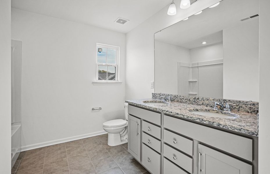 Furnished interior view inside a new home in Parkside Crossing, Charlotte (Image 30).