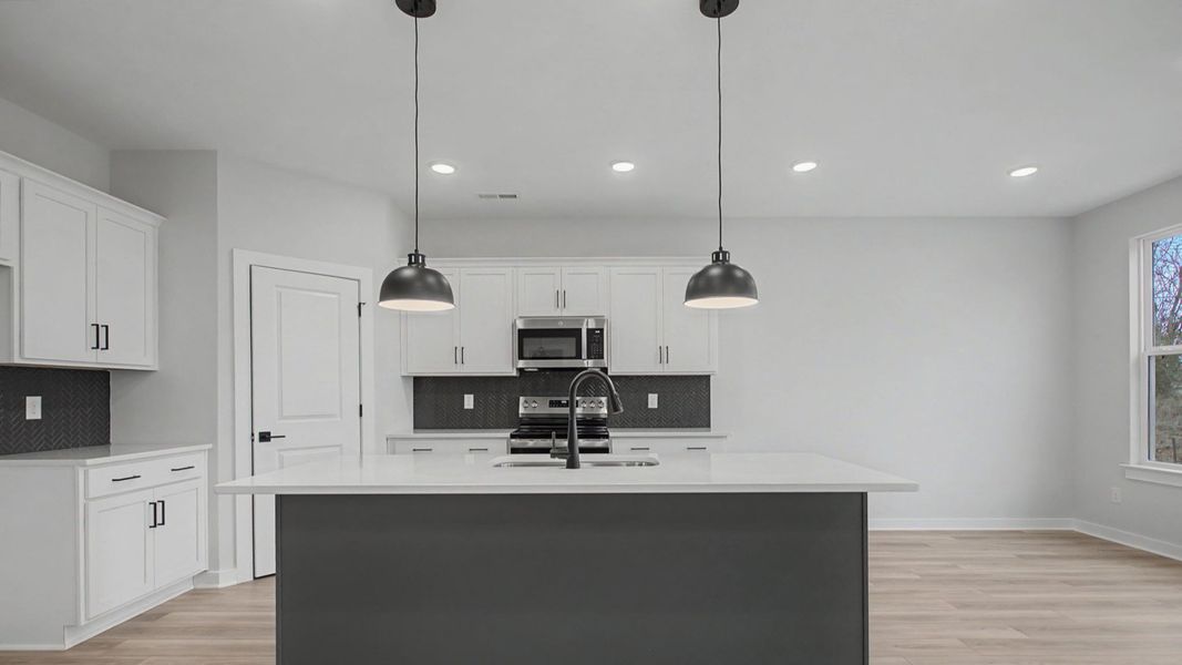 Representative furnished interior of a home built from the Greenwich by DRB Homes in Cottages of Bearwood, Mount Pleasant (Image 7).