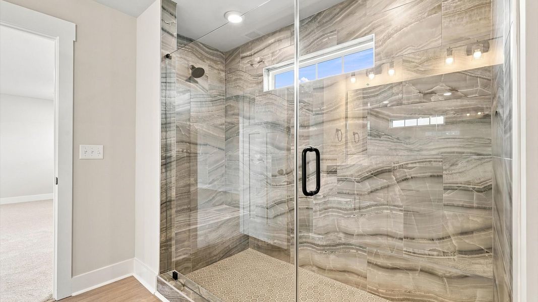 First-rate primary bathroom offering an elegant walk-in shower and superior style located in Inman, SC