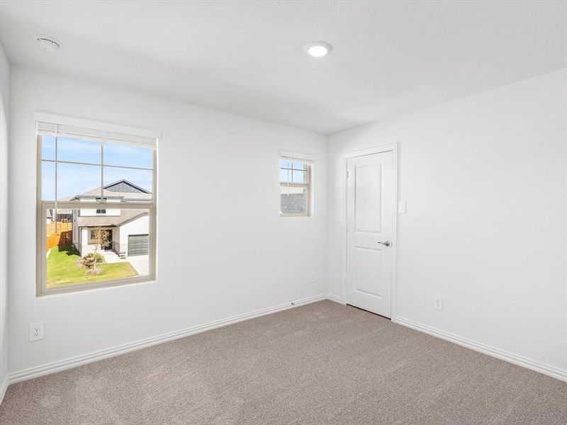 Spacious, unfurnished interior of a new home in Simpson Crossing - Spring Series, McKinney (Image 23).