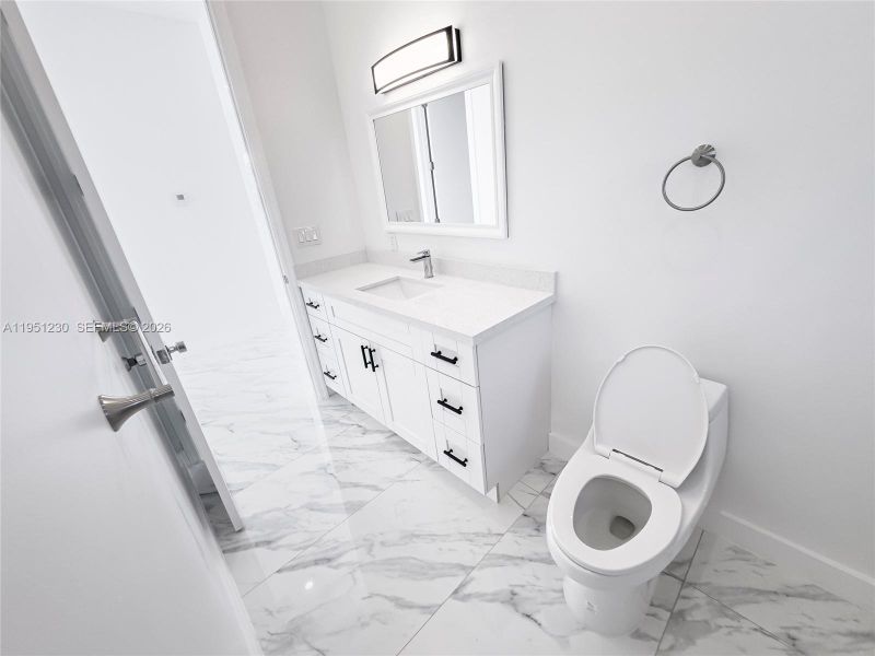 Furnished interior view inside a new home in , Port St. Lucie (Image 17).