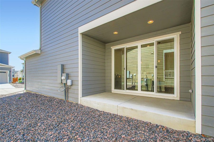 Front exterior of a new home in Haskins Station, Arvada, CO, highlighting curb appeal (Image 25).