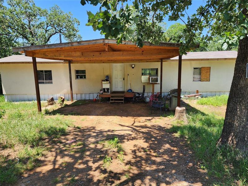 Front exterior of a new home in , Cleburne, TX, highlighting curb appeal (Image 11).