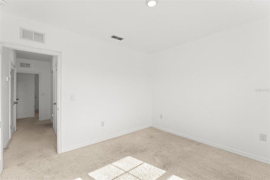 Spacious, unfurnished interior of a new home in Grace Ranch, Haines City (Image 31). Spacious, unfurnished interior of a new home in Grace Ranch, Haines City (Image 31).