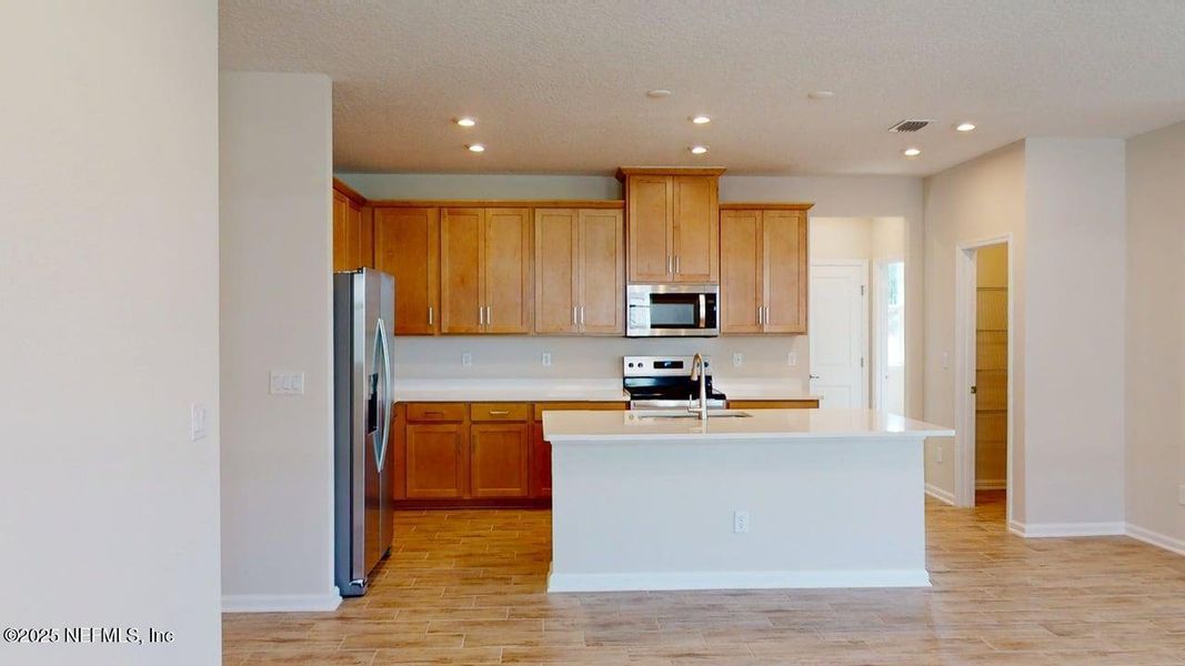 Furnished interior view inside a new home in Lakes at Bella Lago, Green Cove Springs (Image 4).