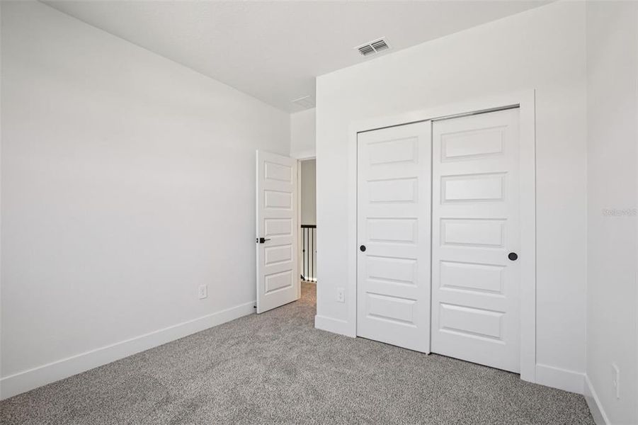 Spacious, unfurnished interior of a new home in Magnolia Bay - Reserve Series, Nokomis (Image 16).