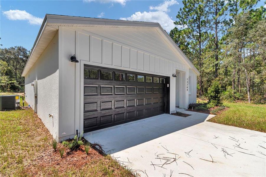 Front exterior of a new home in , Ocala, FL, highlighting curb appeal (Image 25).
