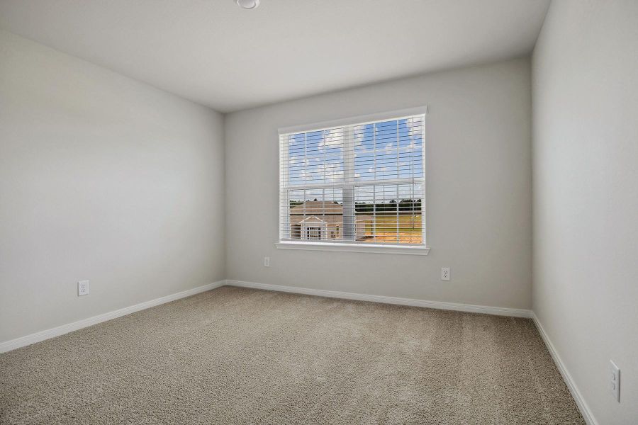 Spacious, unfurnished interior of a new home in Trails at Cochran Ranch, Waller (Image 7).
