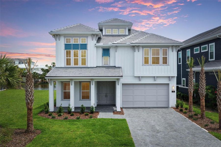 Front exterior of a new home in , Palm Coast, FL, highlighting curb appeal (Image 33).