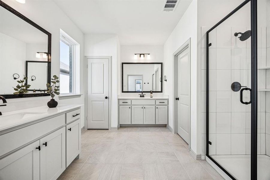 Gorgeous and inviting with a spacious walk in shower, you will enjoy a spa like experience every day in this lovely owner's bath! Gorgeous and inviting with a spacious walk in shower, you will enjoy a spa like experience every day in this lovely owner's bath!