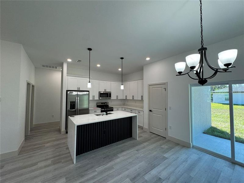 Furnished interior view inside a new home in , Port Charlotte (Image 7). Furnished interior view inside a new home in , Port Charlotte (Image 7).