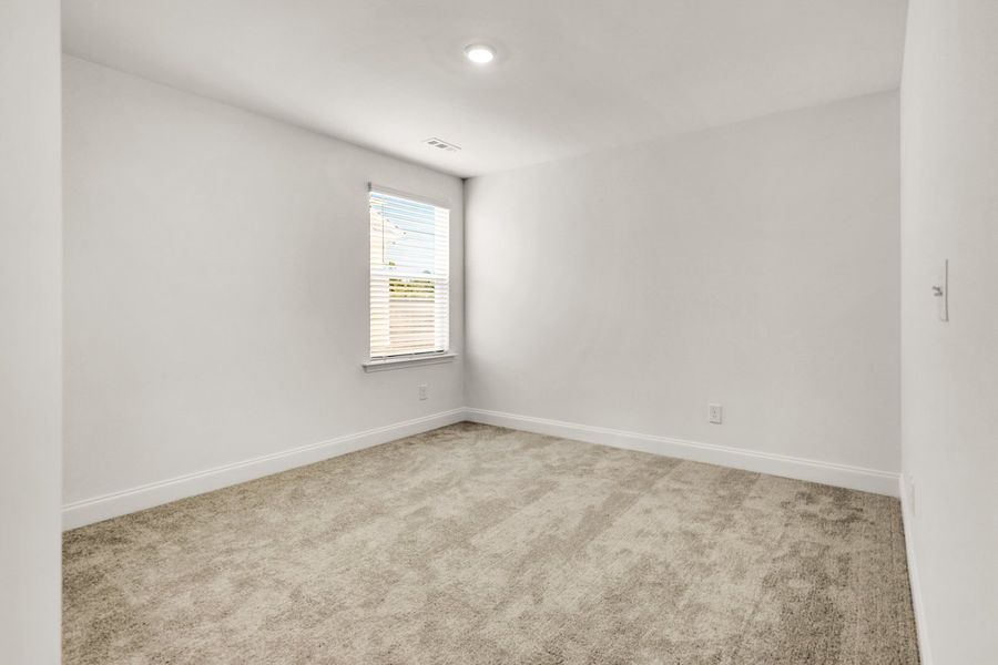 Representative unfurnished interior of a home built from the Titusville II by Regent Homes in Marlon's Creek, Spring Hill (Image 38).