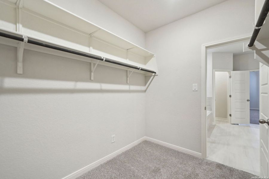 Spacious, unfurnished interior of a new home in Estancia Ranch - Classic Series, San Antonio (Image 30).