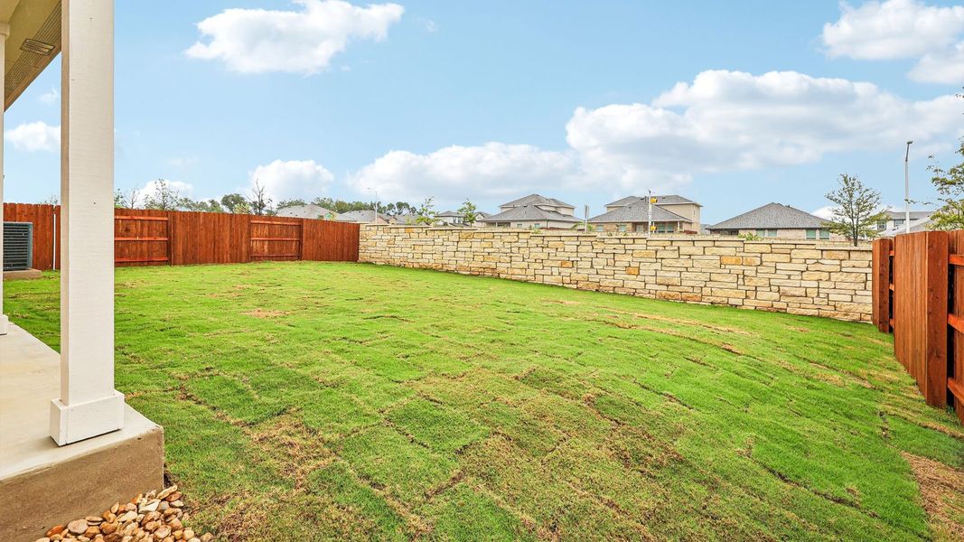 Exterior details and patio area of a home in Bar W Ranch, Leander (Image 4).