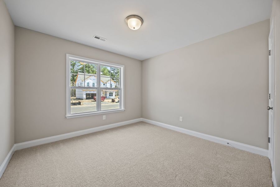 Spacious, unfurnished interior of a new home in Davenport Farms, Winterville (Image 36).