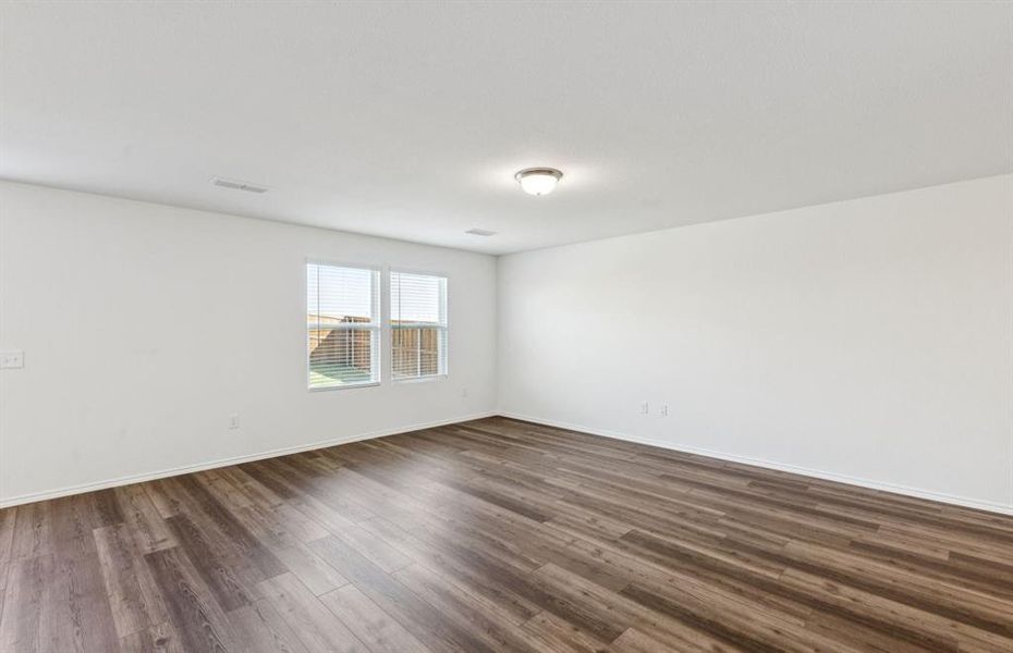 Spacious gathering room with large windows