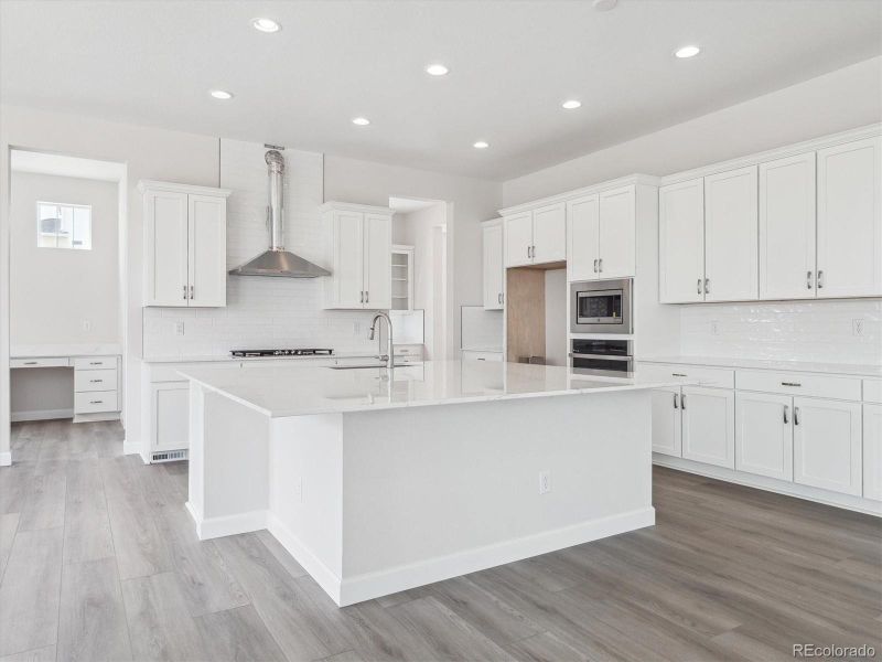 Furnished interior view inside a new home in Vista Pines at Crystal Valley, Castle Rock (Image 12).