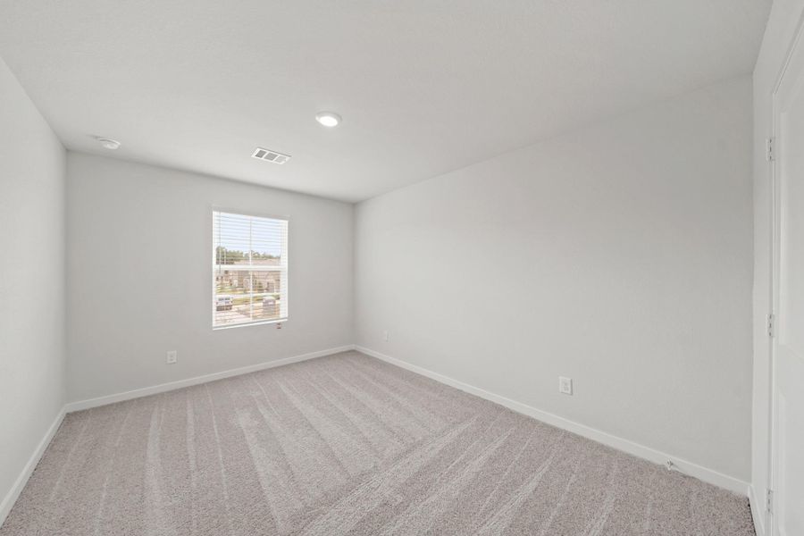 Spacious, unfurnished interior of a new home in Lakes at Black Oak, Magnolia (Image 19).