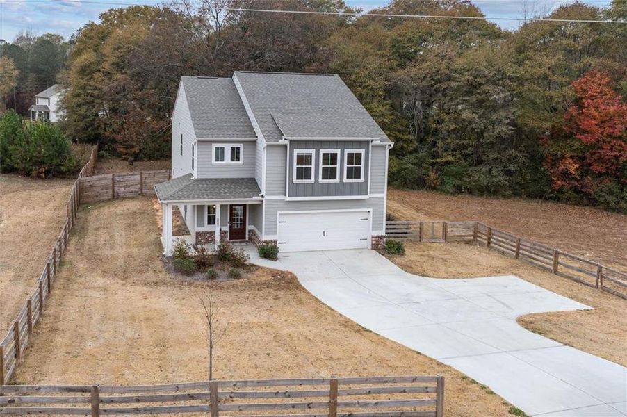 Front exterior of a new home in , Auburn, GA, highlighting curb appeal (Image 27).